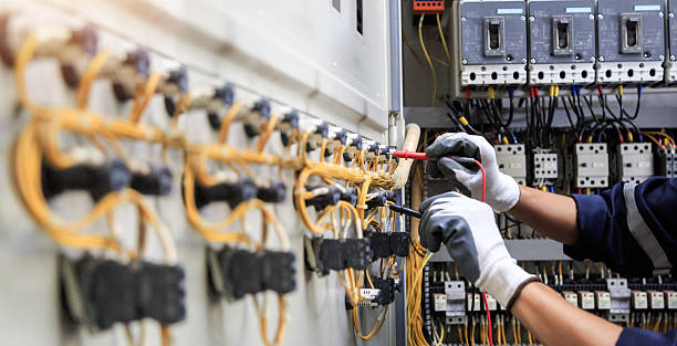 Professional Electrician technician working in Walls, MS